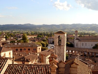  Rooftops of Gubbio and landscape of Umbria in Italy
