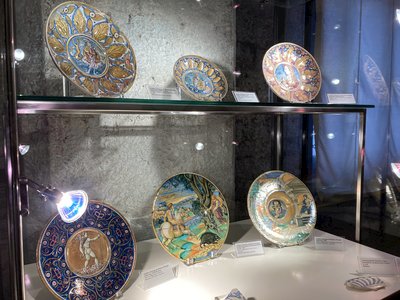 Ceramic plates decorated with paintings displayed in museum, Gubbio, Italy