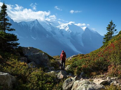 Man looking at mountain while on Chamonix tour du mont blanc hike, France