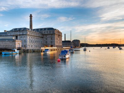Sunset at the Royal William Yard docks in Plymouth, Devon coast